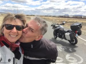 Mary and her husband taking a photo along Route 66
