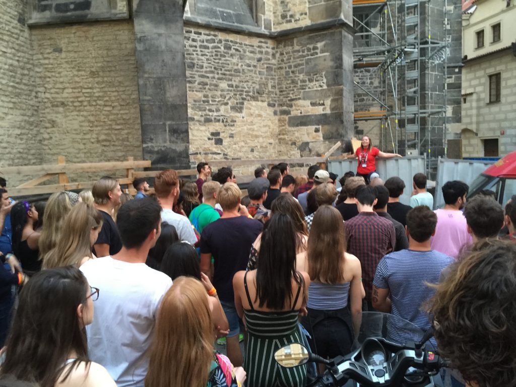 Excited crowd gathering for the Prague Pub Crawl