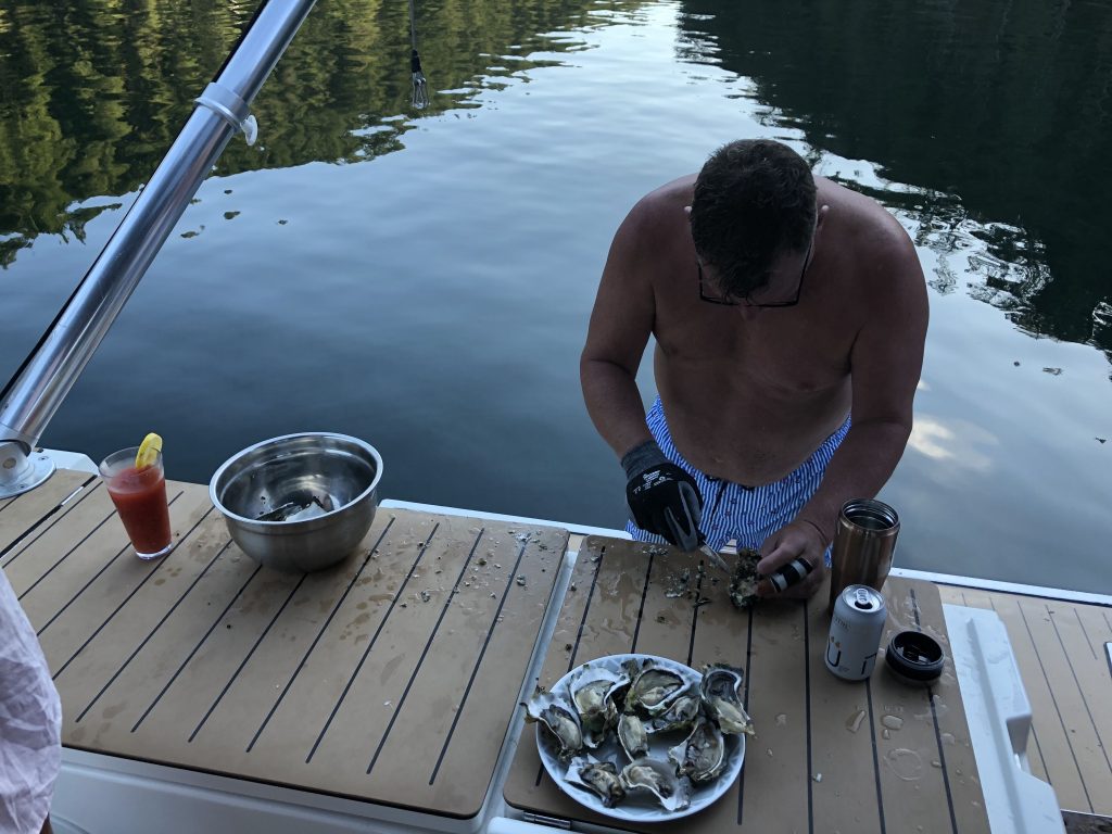 A man preparing oysters