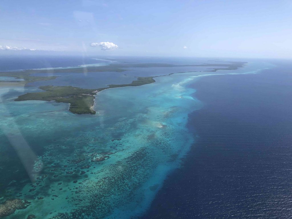 View of the varying water color of the Great Blue Hole