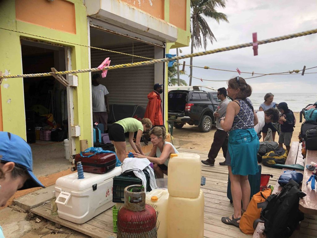 People preparing for their Island Expeditions Belize kayaking adventure in the Dangriga area