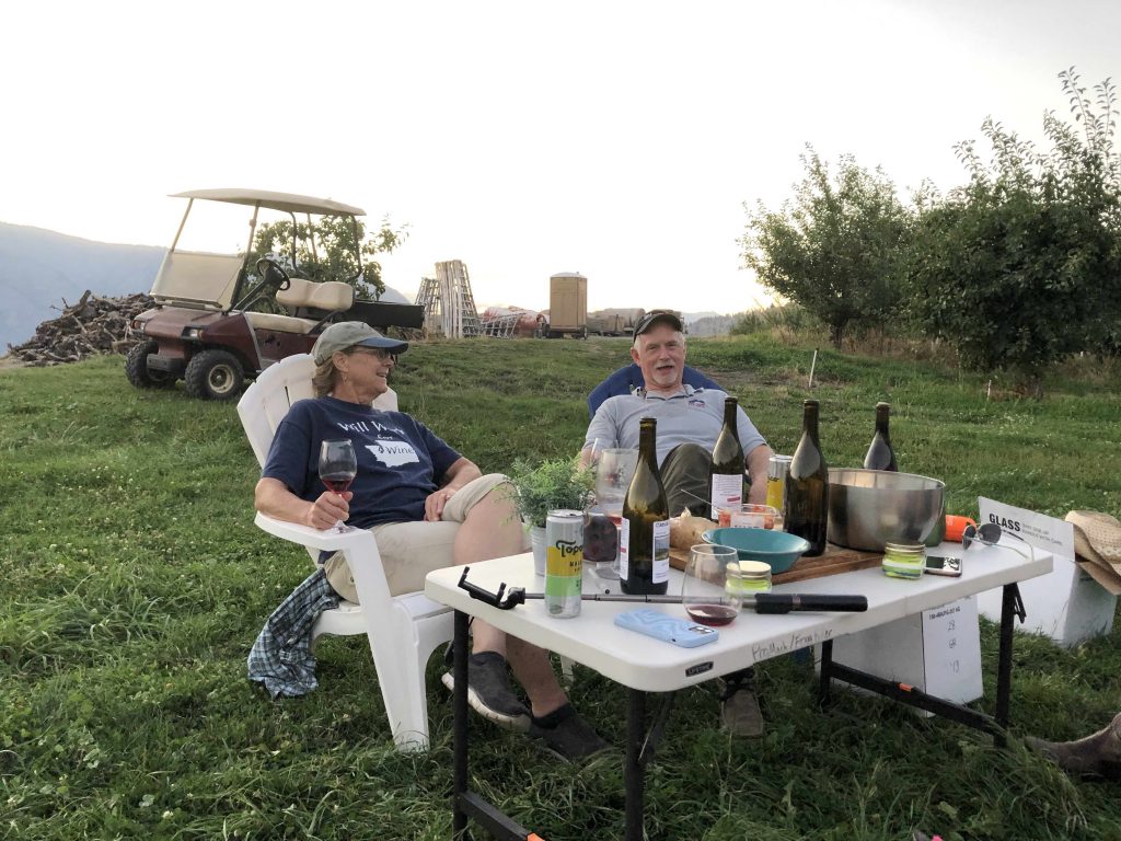 A happy couple drinking wine