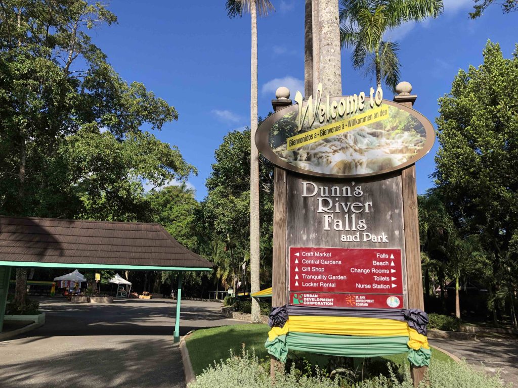 Dunn's River Falls Welcome Sign - Scenic Road Sign for Jamaica's Popular Waterfall Attraction