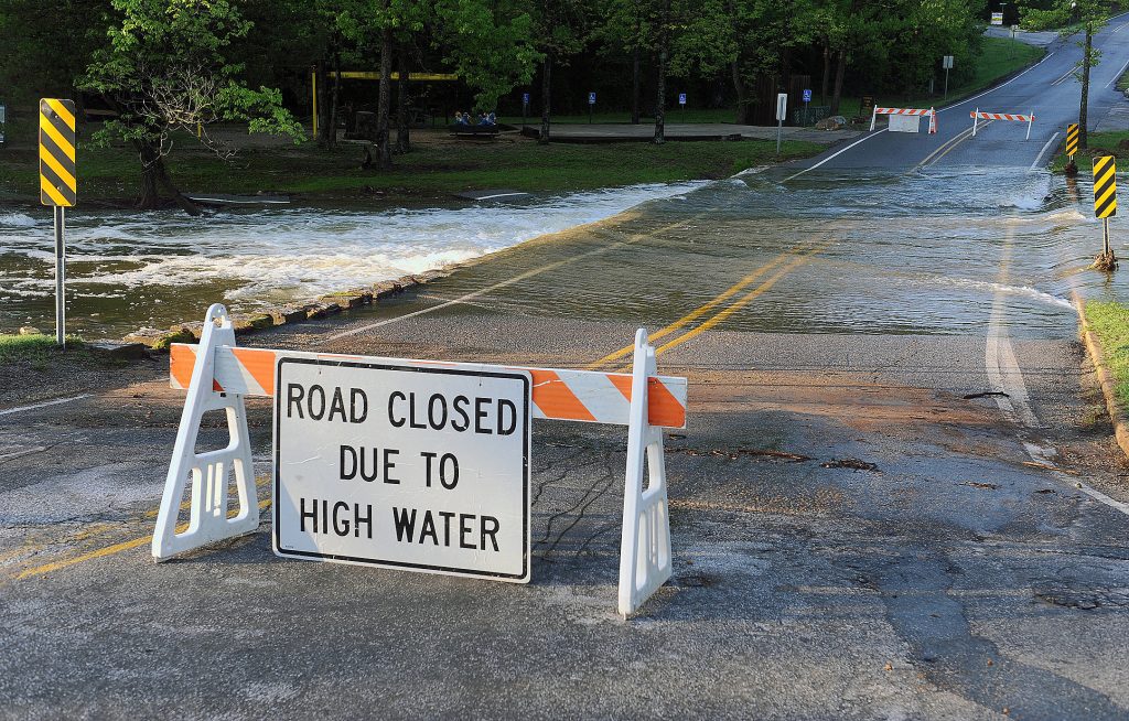 Road Closed Due to High Water road sign