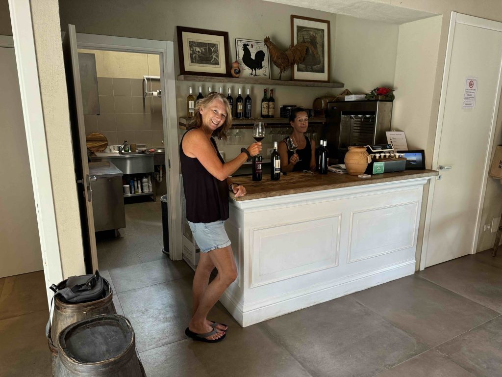 Mary tasting wine
