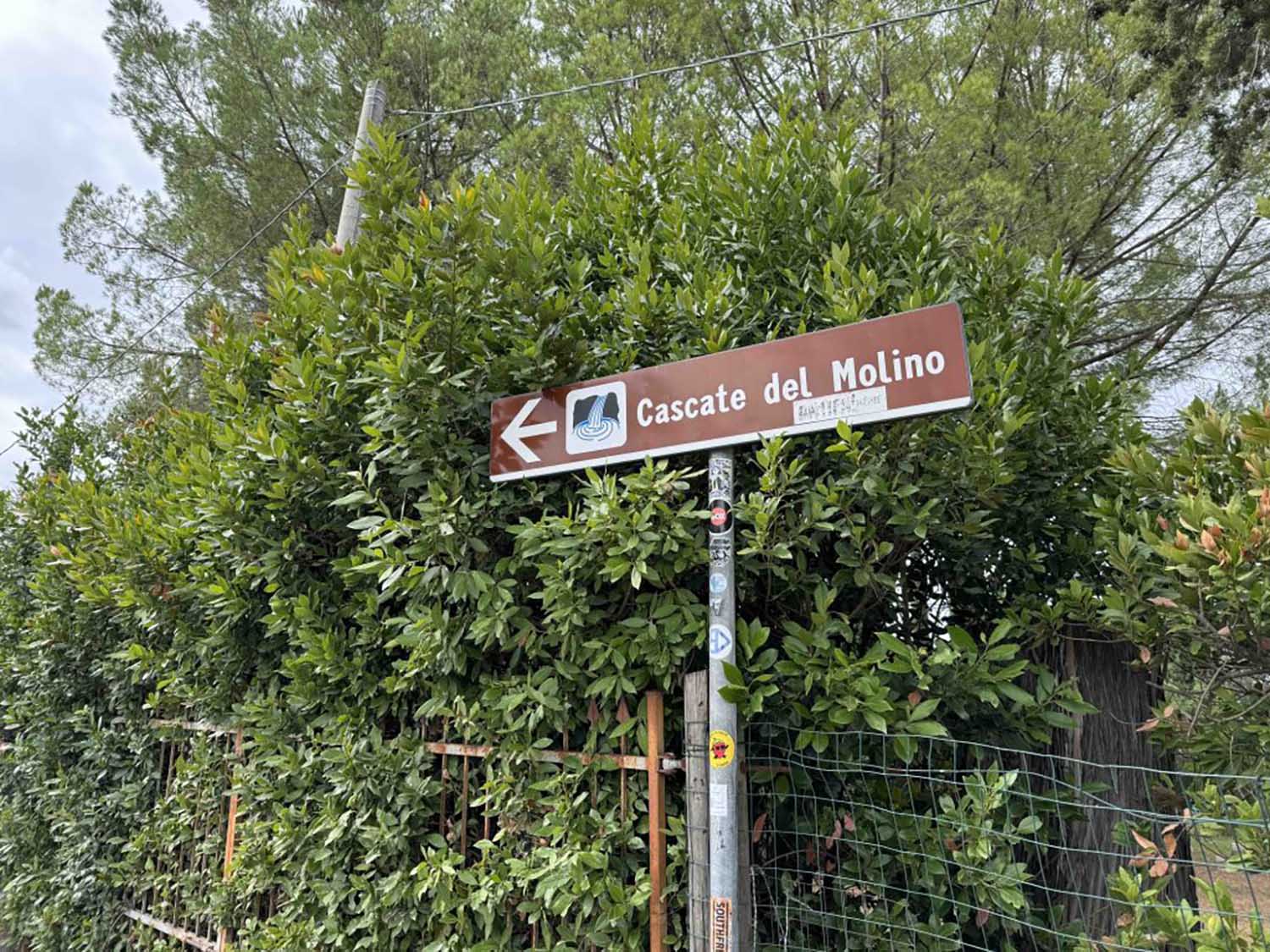 Sign directing people not to park on the road to Saturnia Hot Springs
